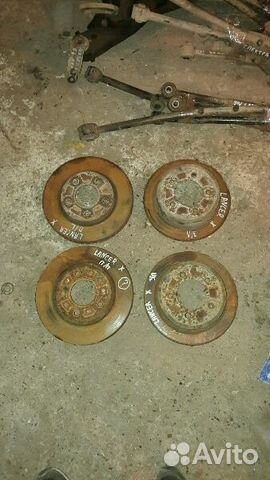 Диск тормозной передний Митсубиси Лансер 10