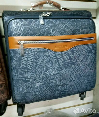 Новый чемодан на колесах - кейс-пилот Новый чемодан на колесах - кейс-пилот