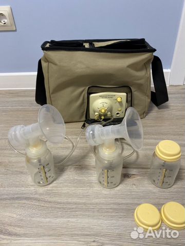 Молокоотсос электрический на две груди Medela doub Молокоотсос электрический на две груди Medela doub