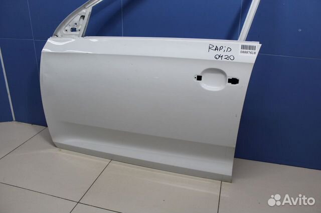 Дверь левая передняя Skoda Rapid