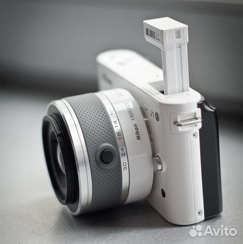 Nikon 1 j1 подключение к портативному аккумулятору