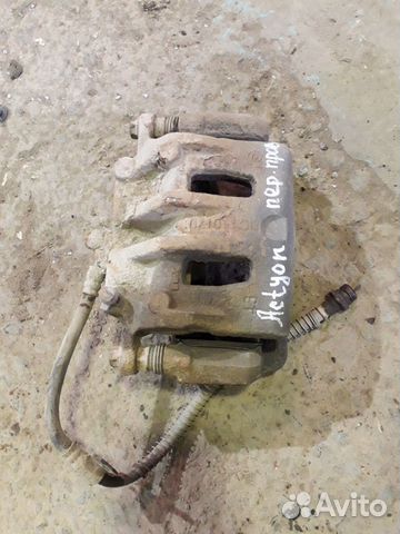 Суппорт тормозной передний Актион Нью Actyon New