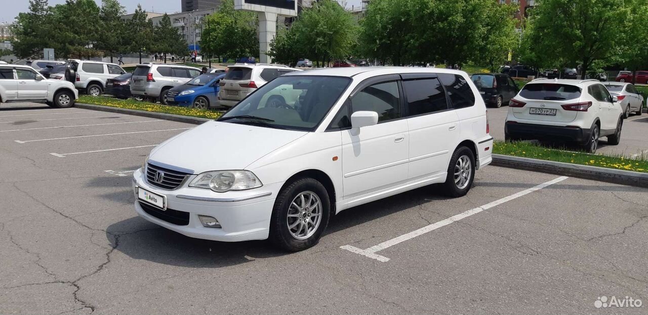 Одиссея авито. Honda Odyssey 2002 белый чёрная крыша.