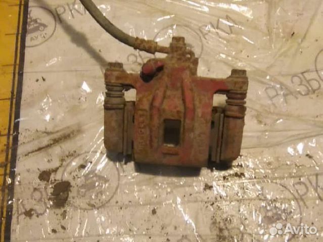 Суппорт тормозной задний левый Chevrolet Lacetti