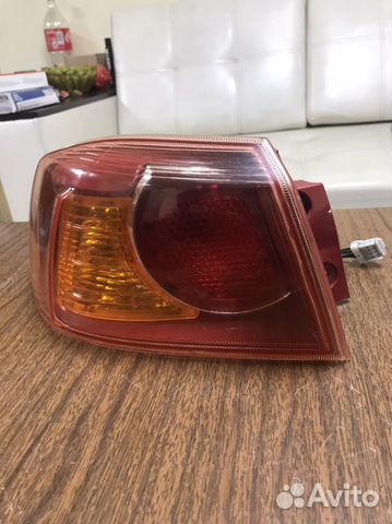 Фонарь левый в крыло Mitsubishi Lancer 10 X