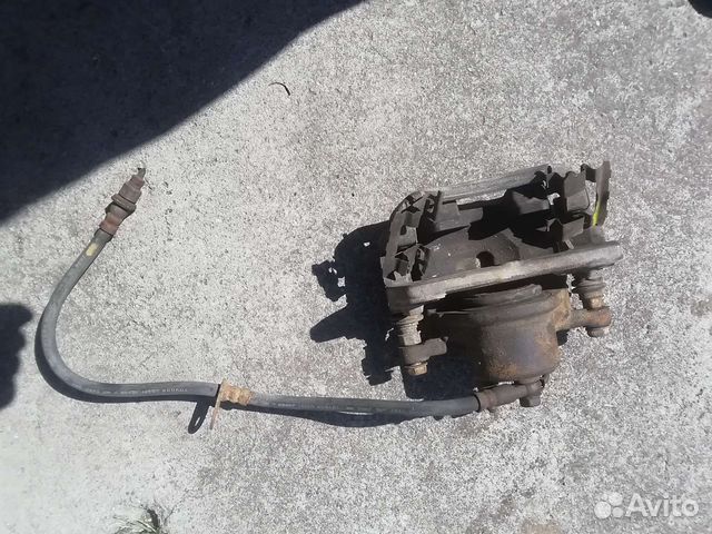 Суппорт передний правый на тойота плац