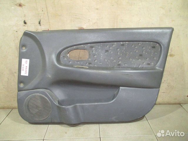 Обшивка двери передней правой Kia Spectra