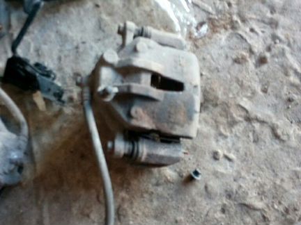 Суппорт передний левый киа сид 1 с06-12г