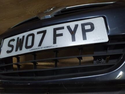 Решетка бампера Opel Corsa D 2006-2010