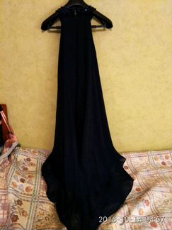 Вечернее платье со шлейфом из бутика