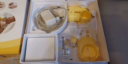 Молокоотсос Medela mini electric