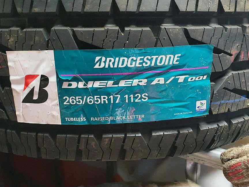 265 65 17 отзывы. Bridgestone Dueler a/t 001 265/65 r17 112s. Bridgestone 245/65r17 112s Dueler a/t 001 TL. Bridgestone Dueler a/t 265/65 r17 112s. Bridgestone Dueler a/t 693 265/65 r18.